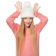 Image showing Girl gesturing imitating deer antlers