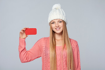 Image showing Woman wearing woolen hat and sweater