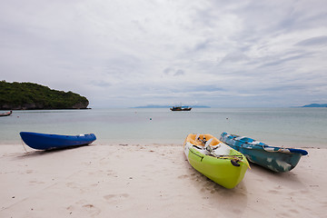 Image showing Colorful kayaks on beach in Thailand