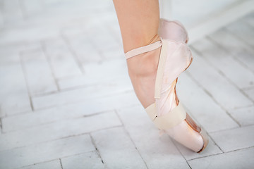 Image showing the leg of a ballerina on white background