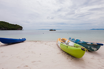 Image showing Colorful kayaks on beach in Thailand