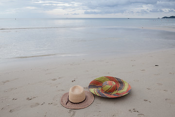 Image showing Beach on tropical island. Clear blue water, sand, clouds. 