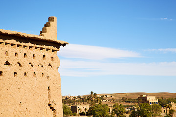 Image showing brown old  construction in  africa morocco and palm tree