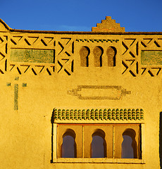 Image showing old brown construction in africa morocco and sky  near the tower