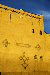 Image showing old brown construction in africa morocco   sky  near the tower