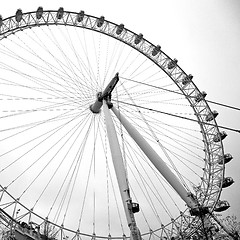 Image showing london eye in the spring sky and white clouds