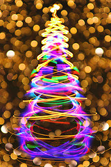 Image showing christmas tree with golden background