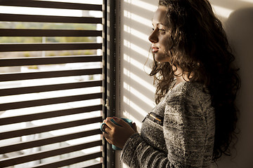 Image showing Thoughtful young girl