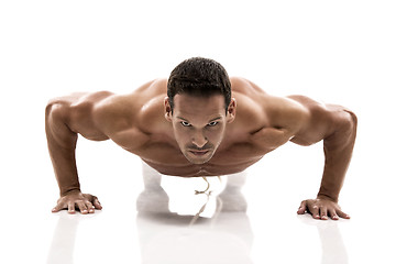 Image showing Muscle man making pushups