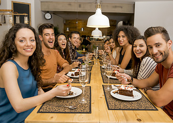 Image showing Friends lunching at the restaurant