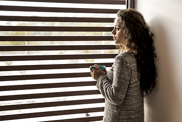 Image showing Thoughtful young girl