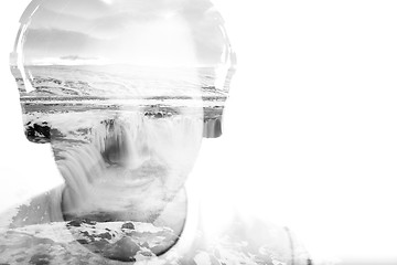 Image showing Young man with headphones and waterfall, double exposure