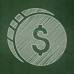 Image showing Currency concept: Dollar Coin on chalkboard background