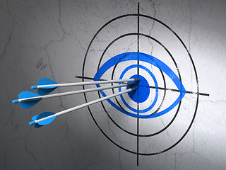 Image showing Safety concept: arrows in Eye target on wall background