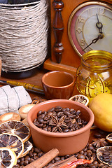 Image showing coffee beans, candle, old bottle, vintage clock, lemon, cinnamon, anise and aroma spice