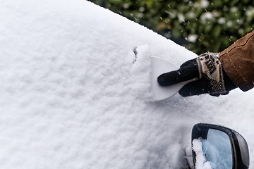 Image showing Snowy car