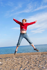 Image showing Girl child jumping