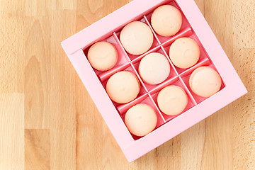 Image showing Pink macarons in package