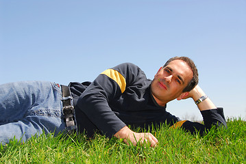 Image showing Man lying on grass