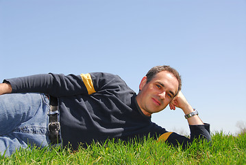 Image showing Man grass sky