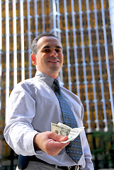 Image showing Businessman offer money