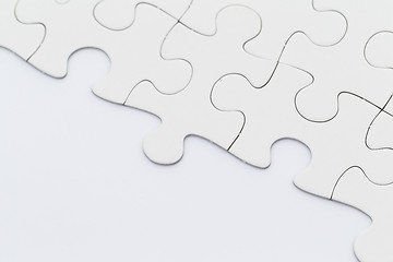 Image showing White incomplete jigsaw puzzle