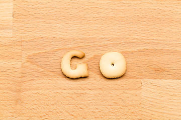 Image showing Word go cookie over the wooden background