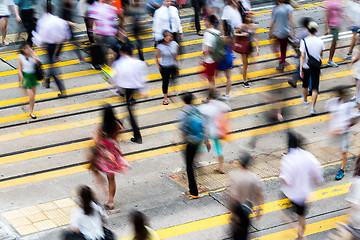 Image showing Motion blurred pedestrians crossing Hong Kong street 
