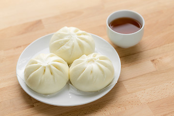 Image showing Chinese tea time, bun and tea
