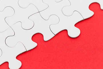 Image showing Puzzle over red background