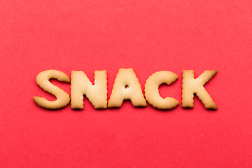 Image showing Word snack cookie over the red background