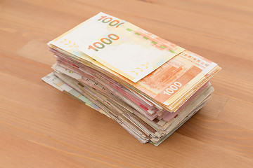 Image showing Stack of Hong Kong dollar on the table