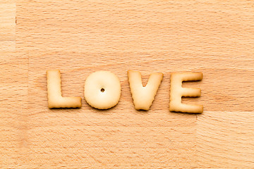 Image showing Word Love biscuit over the wooden background