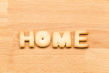 Image showing Word home cookie over the wooden background