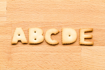 Image showing Letter ABCDE cookie over the wooden background