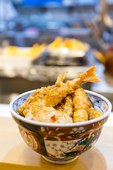 Image showing Tempura served over a bowl of rice