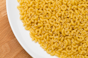 Image showing Italian Macaroni Pasta raw food on white plate