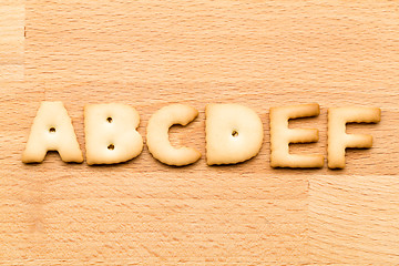 Image showing Letter ABCDEF cookie over the wooden background
