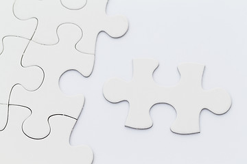 Image showing White puzzle over the white paper