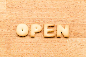 Image showing Word open cookie over the wooden background