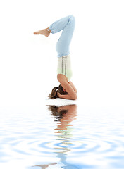 Image showing salamba sirsasana supported headstand on white sand #2