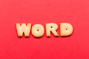 Image showing Word biscuit over the red background