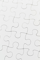 Image showing White jigsaw puzzle pattern as a background