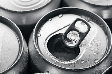 Image showing Top of open wet beer can close up