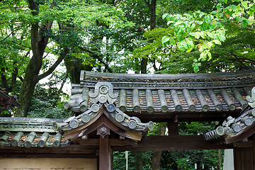 Image showing Japanese temple tile roof in park