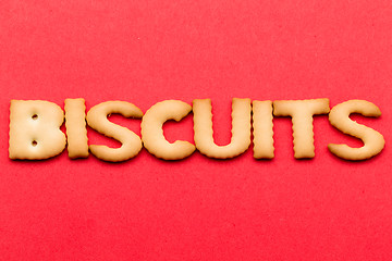 Image showing Word biscuits over the red background