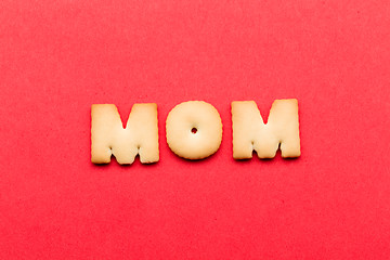 Image showing Word mom cookie over the red background