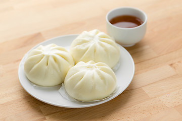 Image showing Chinese tea and steamed bun