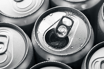 Image showing Opened and closed canned drinks