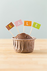 Image showing Flag on muffin with a word sale